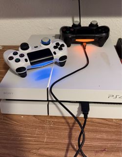 Sony PS4 Console White with Two Controllers