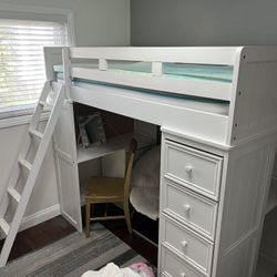 Loft Bed With A Dresser And Desk