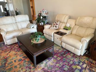 Lazy Boy rocking/reclining white leather couch and loveseat