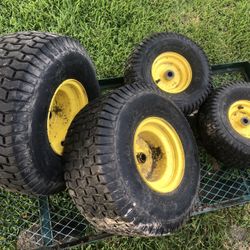 John Deere riding mower tires in good condition