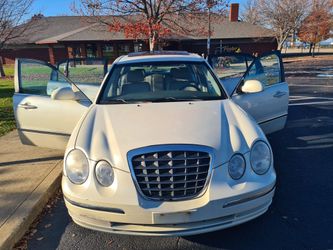 Kia Amanti . Sedan 4D