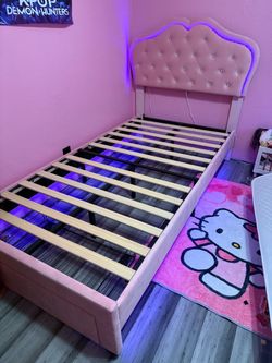 Pink twin bed frame with one drawer
