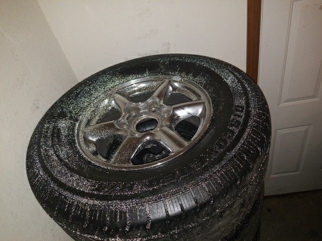 Cadillac chrome rims amd tires