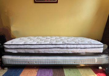 Camper size bed frame plus mattress.