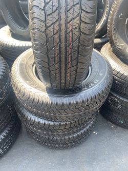 SET DUNLOP 265/70/17 SEMI NEW 95 %TREAD LIFE $280 PRICE INCLUDES PROFESSIONAL INSTALLATION AND TAX