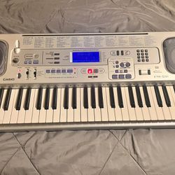 Casio CTK-571 61-Note Touch-Sensitive Portable Electronic Keyboard