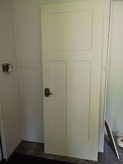 Three panel solid core door