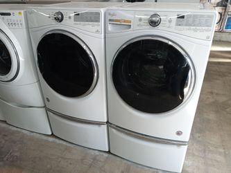 Whirlpool front load washer and dryer set on pedestals - Free delivery