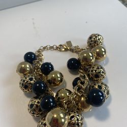 Kate Spade New York Gold Tone Chaim Bracelet With Black And Gold Beads