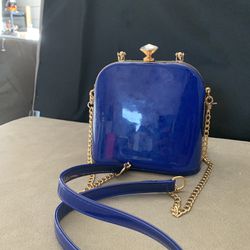 La Terre blue patent blue & gold tone evening bag/clutch