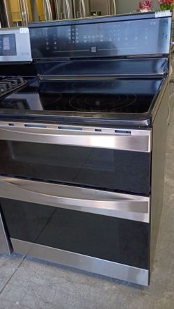 Electric stainless double oven glass top five burners with warranty delivery available fee depends on address