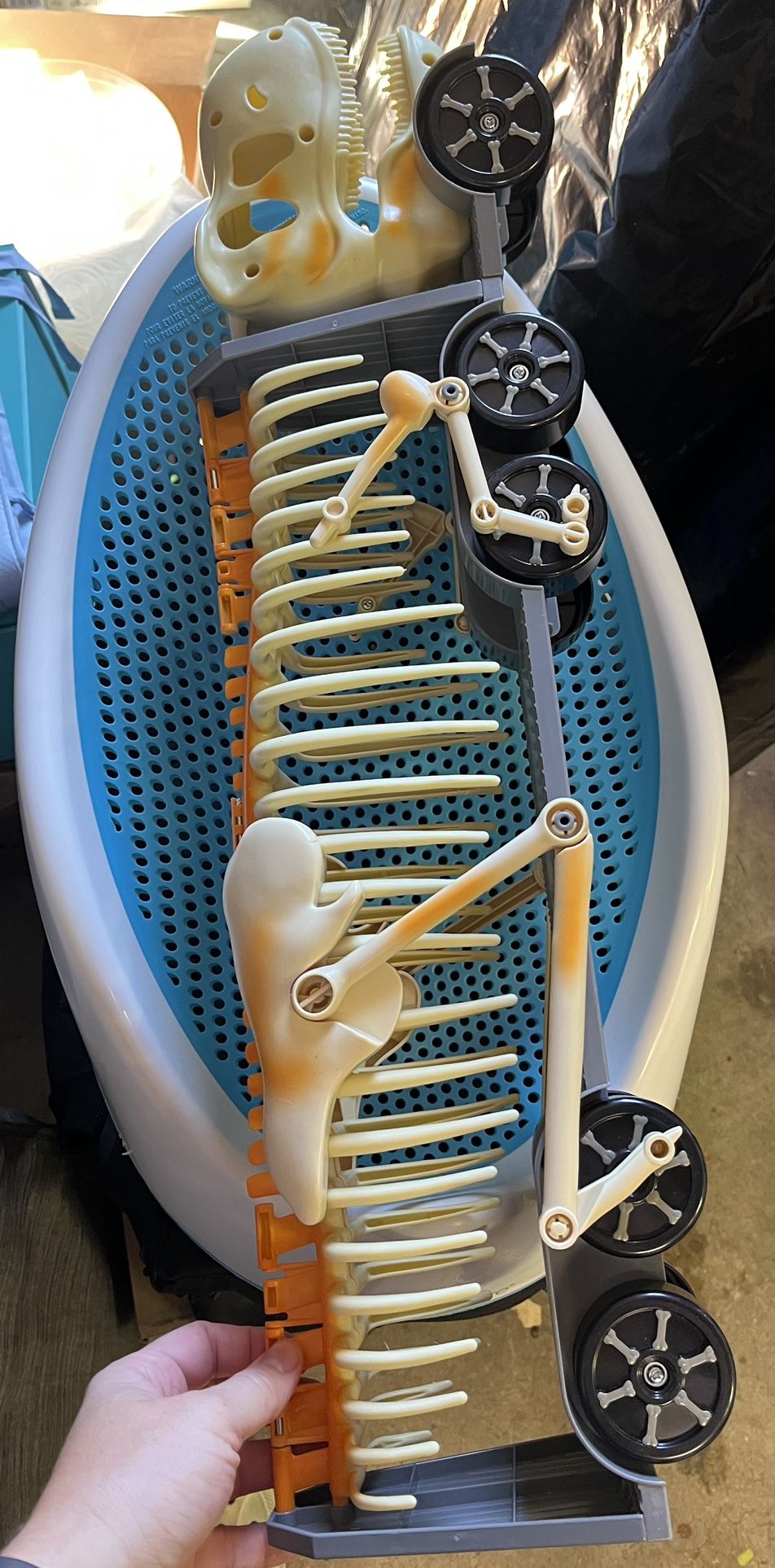 Baby bathtub support, crib liner, dinosaur car holder