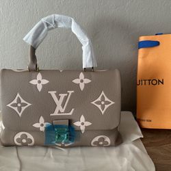Louis Vuitton Brown Shoulder Bag With Iconic Monogram 