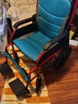 Transport wheelchair