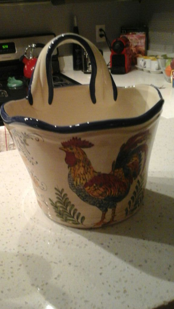 Brand new ceramic plant holder with rooster on front. Price reduced !
