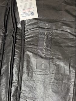 Padded travel ski/snowboard bag with wheels