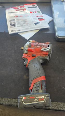 Milwaukee Impact and Battery 3/8