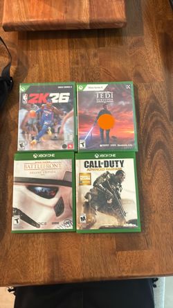 Unopened copy of 2k26 and Star Wars Jedi survivor and a opened copy of Star Wars battle front and call of duty advanced warfare