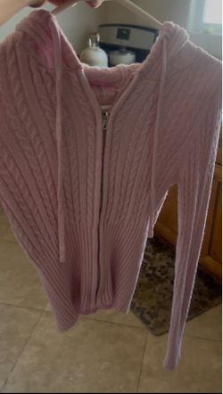 Pink knitted sweater