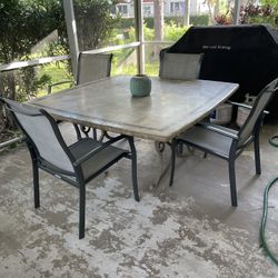 Stone Outside Table 64”x64” With 4 Chairs 