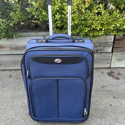 American tourister carryon luggage suitcase, 2 wheels.  Approximately 20”
