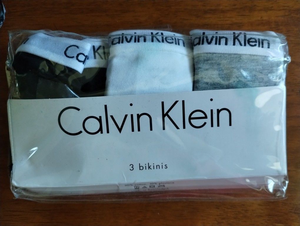 Calvin Klein Women's Carousel Logo Cotton Stretch Bikini Panties 3 Pack Small.
