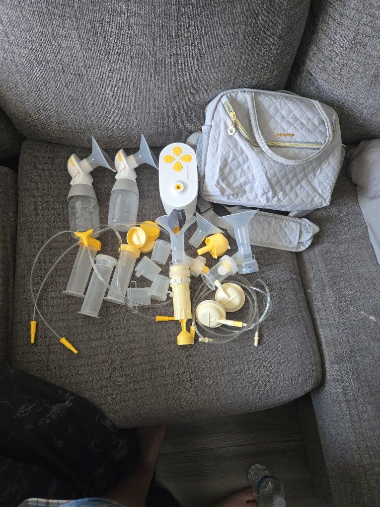 Medela Pump With Hand Pump And More