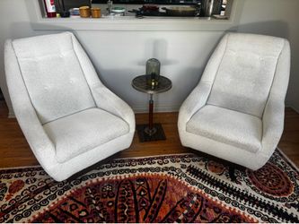 POSTMODERN Pair of high-back lounge chairs,1980s Boucle, leather.  Each: 36" H x 28.5" W x 34.5" D Seat height: 16.5"