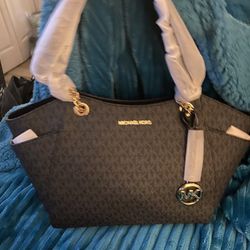 Authentic  Michael Kors With Gold Hardware