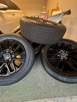 Toyota  Tundra 20 " B lack wheels and tires