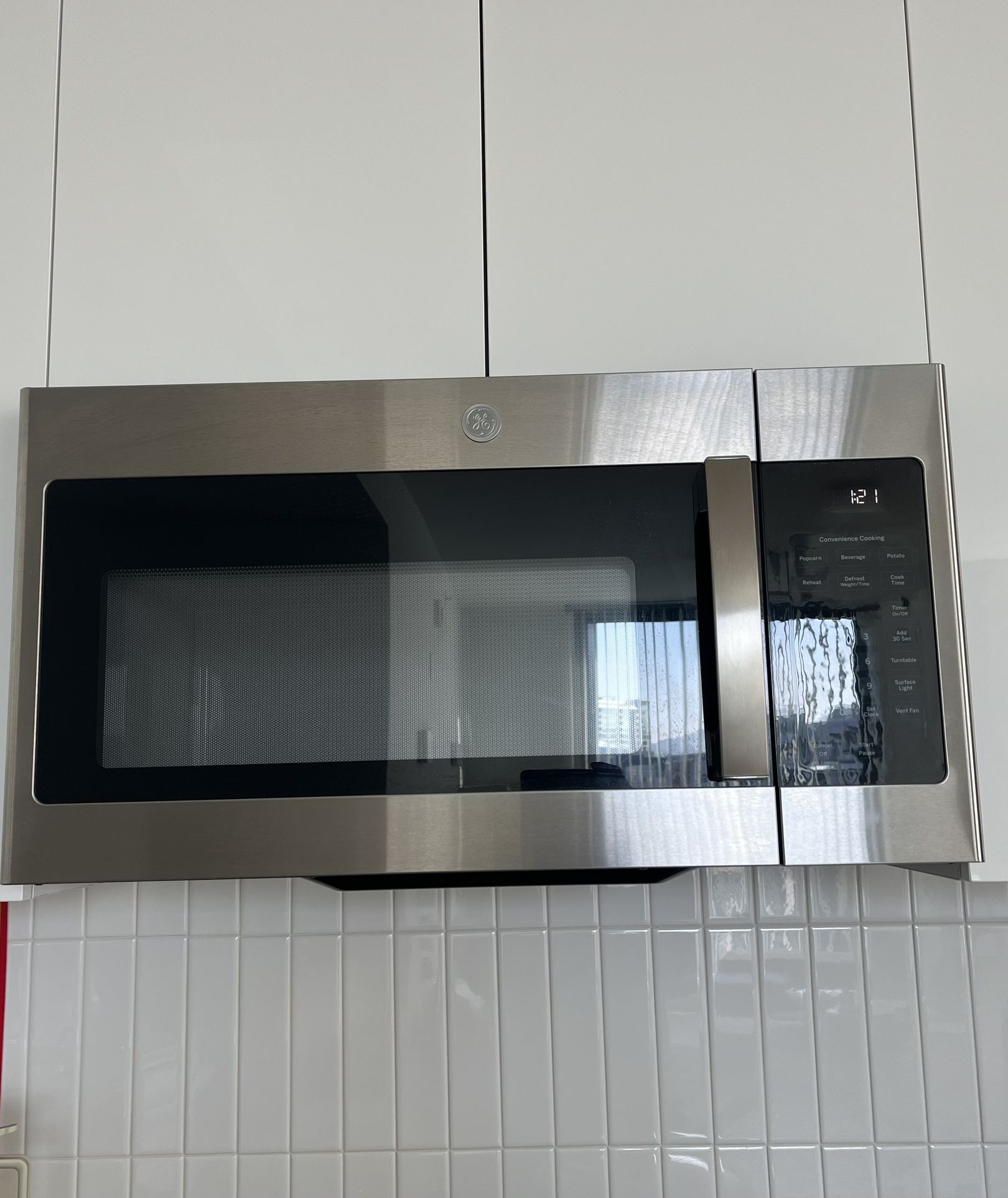 GE JVM3160RFSS 1.6 Cu. Ft. Over-the-Range Microwave Oven Stainless Steel