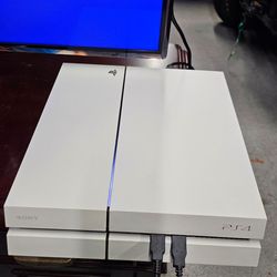 White PS4 w/Remotes and Games