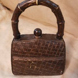 International Bazaar Weighted Resin Purse Doorstop