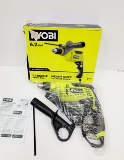 Ryobi hammer drill has 6.2 amp motor and 1/2 inch keyed chuck. It comes with original box, manual, and auxiliary handle.