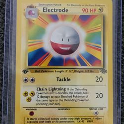 Pokémon Electrode 1st Edition 18/64 - Jungle Error - NM - Rare ©️1999
