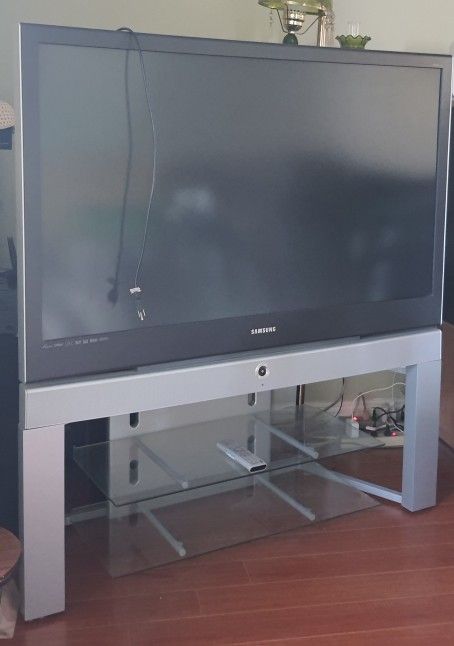 Free TV, 70 Inch Flat Screen w/ remote and stand