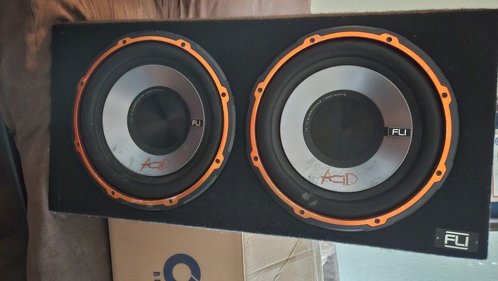 FLI Audio FA12TA-F1
1000 Watt Dual 13" Acid Series Subwoofer With Amp