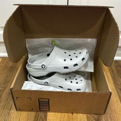 New Light Gray Crocs Size Men’s Size 7 M Woman’s Size 9 