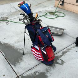 Gold Bag With Clubs