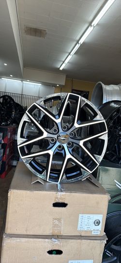 Silver machine black wheels