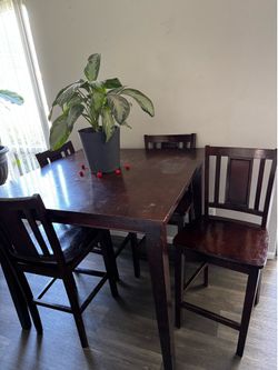 Wooden kitchen / dining room table and chairs