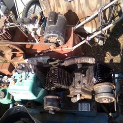 1 Gas Air Compressor. And 1 Electric Air Compressor.