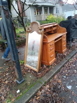 This is a Drexel Corinthian mirror in cherry wood