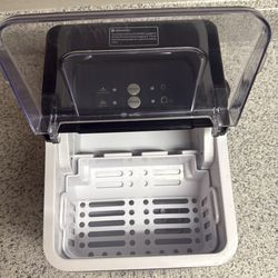 This item is a KUMIO Portable Countertop Ice Maker Machine.  Capacity: Produces up to 26.5 pounds of ice in 24 hours. Speed: Makes 9 bullet-shaped ice