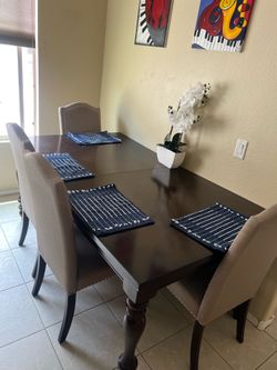 Dining table with 6 chairs and extension leaf