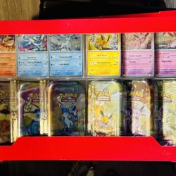 Pokemon Prismatic Evolutions Mini Tin Set