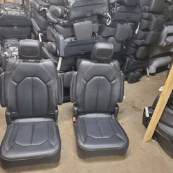 BRAND NEW BLACK LEATHER BUCKET SEATS 