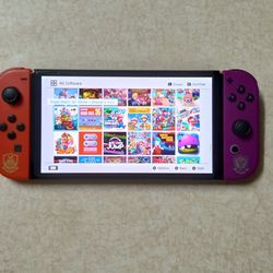 NINTENDO SWITCH OLED with 125 GAMES INSTALLED and Over 7000 RETRO GAMES