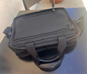 Tumi Black Bag