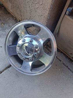 4 stock wheels ford 250 ,, 17x7...8 lug nuts..